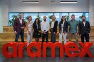 Gambit-and-Aramex-Teams-Join-for-a-Celebration-Photo-320x212.jpg